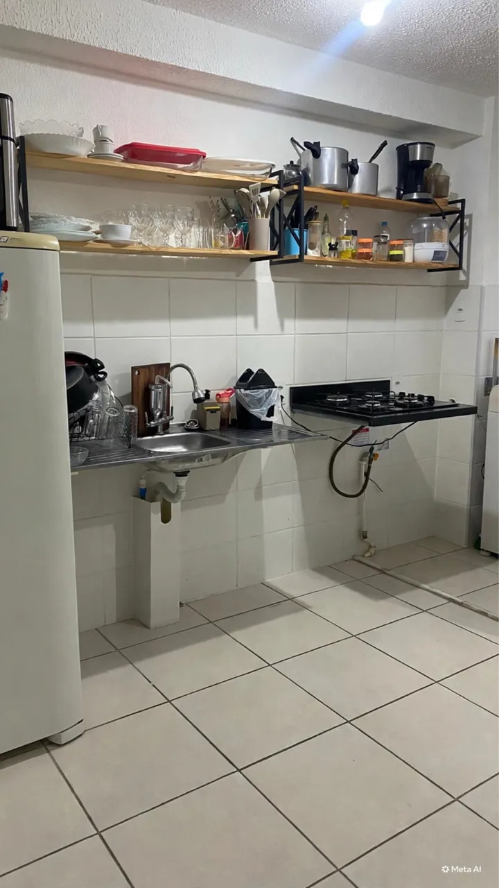 2-bedroom apartment in a building with a pool — photo 2