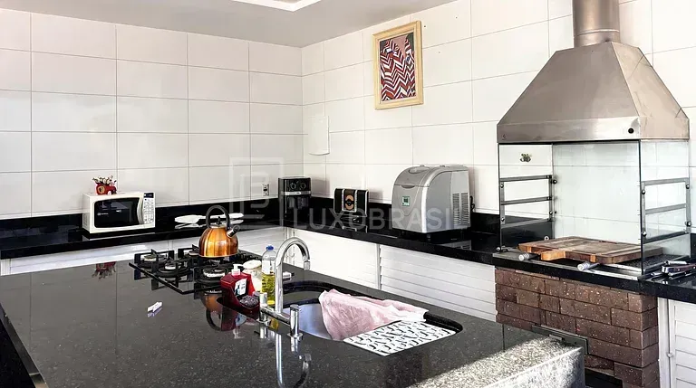 Casa mobiliada com cozinha americana a gás e 5 suítes — photo 7
