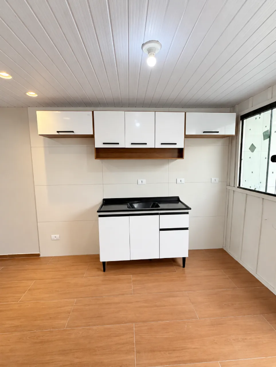 Wood or laminate floors in a 3-bedroom house, 55 m² — photo 11