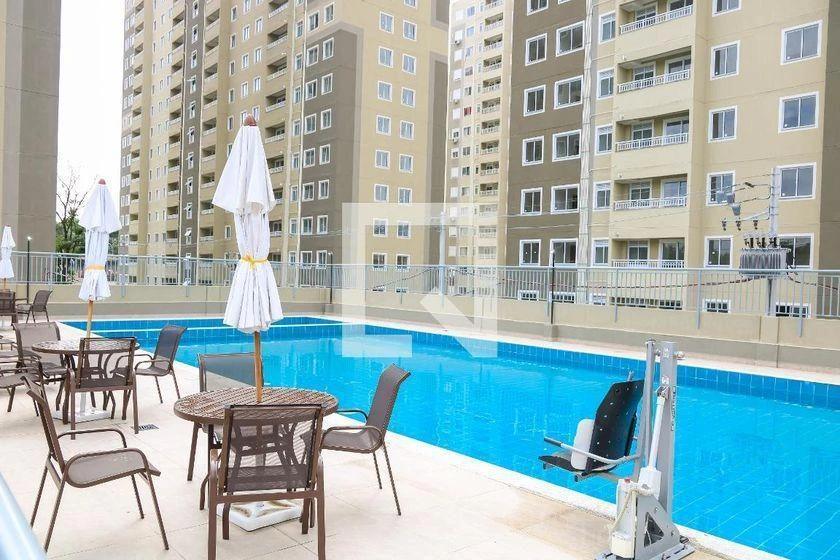 2-bedroom apartment in a building with a pool — photo 18