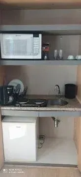 Furnished 1-bedroom apartment with glass-enclosed shower — photo 10
