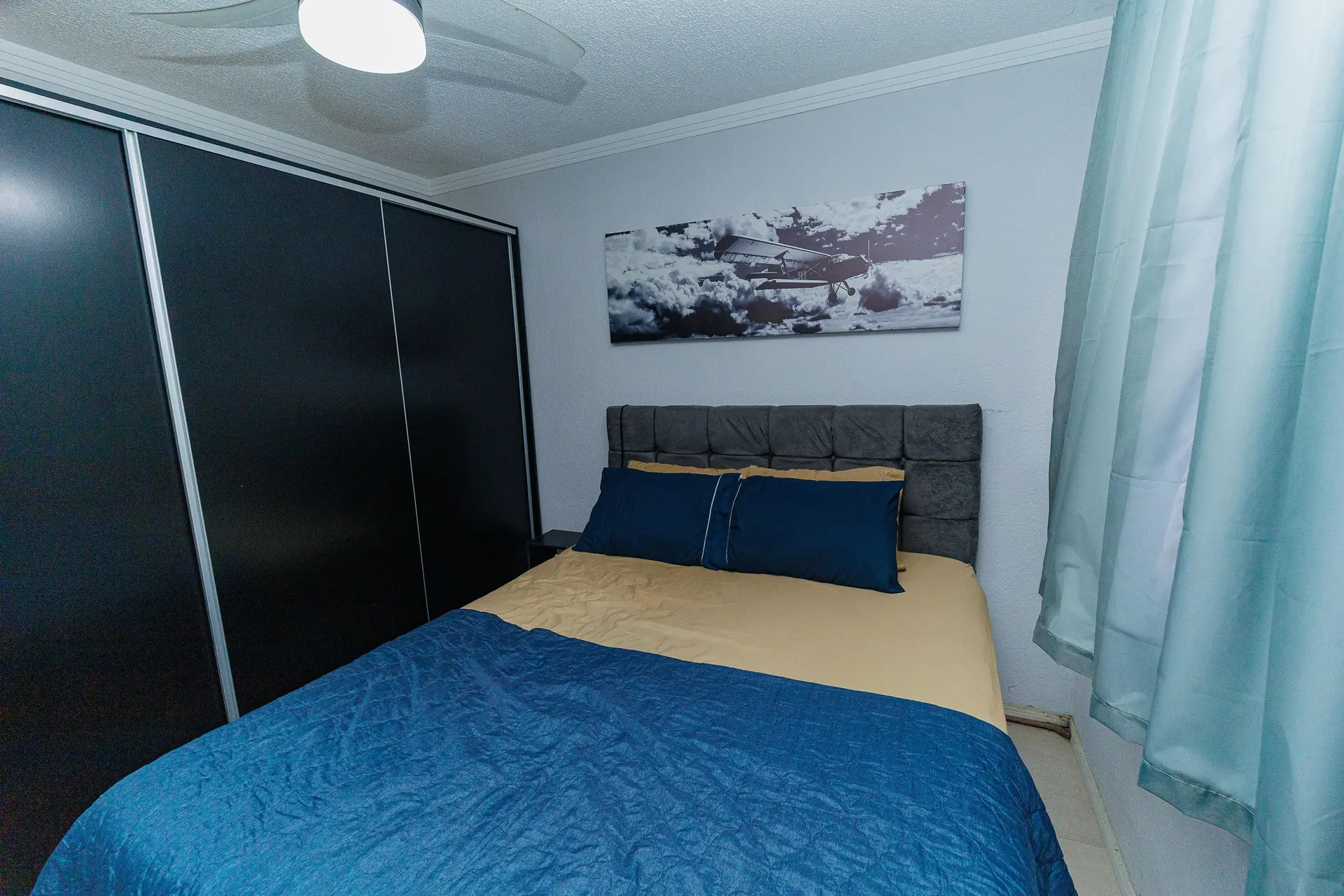 2-bedroom apartment in a building with a pool — photo 7