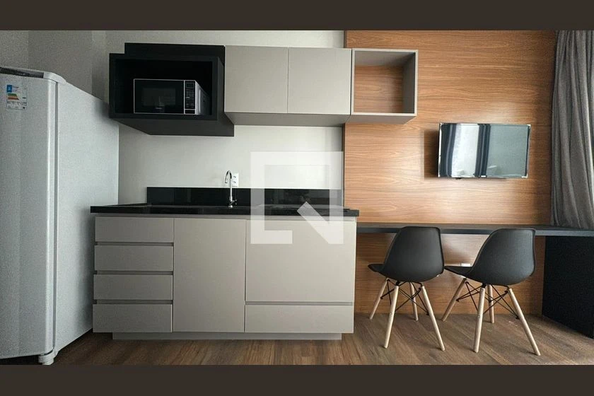 Furnished studio with 1 bedroom and compact kitchenette — photo 9