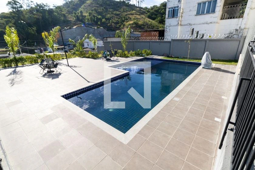 2-bedroom apartment in a building with a pool — photo 39