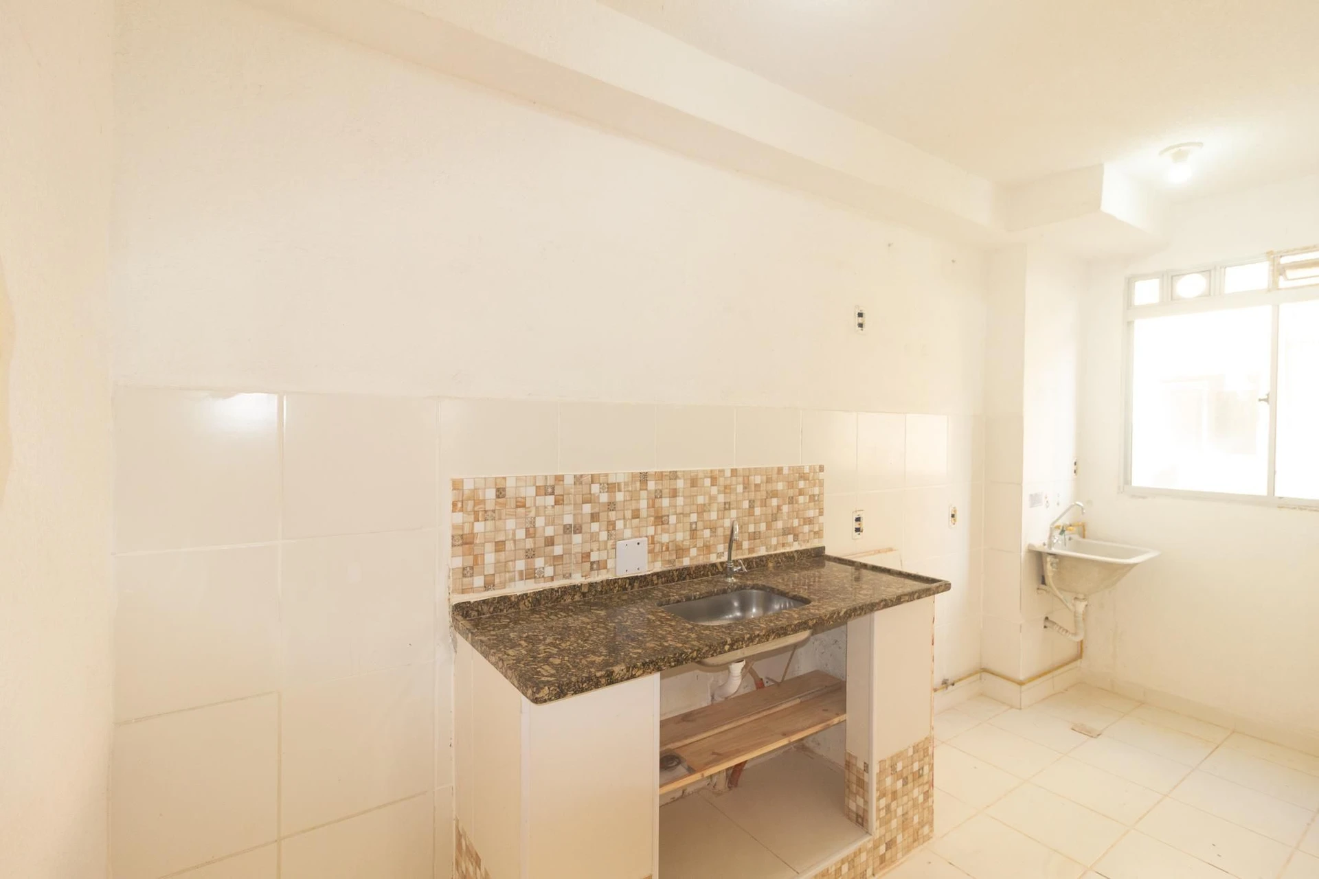 Apartment with 2 bedrooms and a kitchenette stove — photo 16