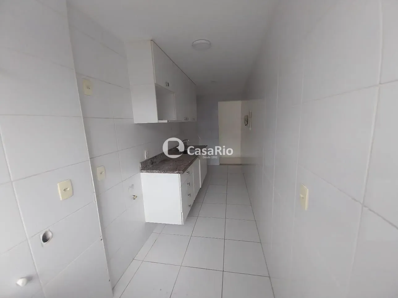 2-bedroom apartment in a building with a pool — photo 18