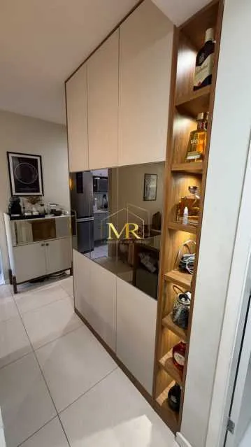 2-bedroom apartment in a building with a pool — photo 19