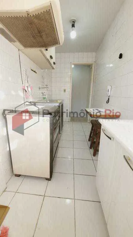 2-bedroom apartment in a building with a pool — photo 14