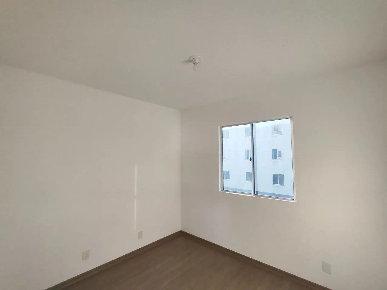 2-bedroom apartment in a building with a pool — photo 5