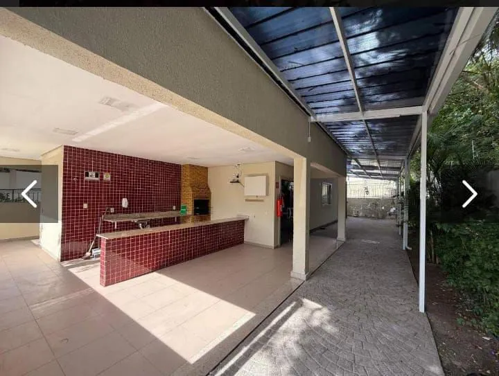 2-bedroom apartment in a building with a pool — photo 7