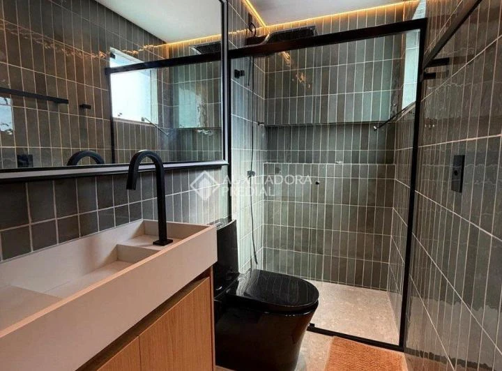 Apartamento de 29 m² com box de vidro no banheiro — photo 8