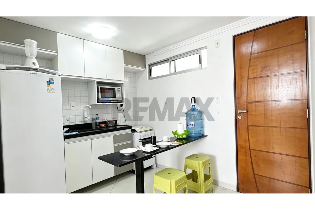 One-bedroom apartment in a building with a pool — photo 6