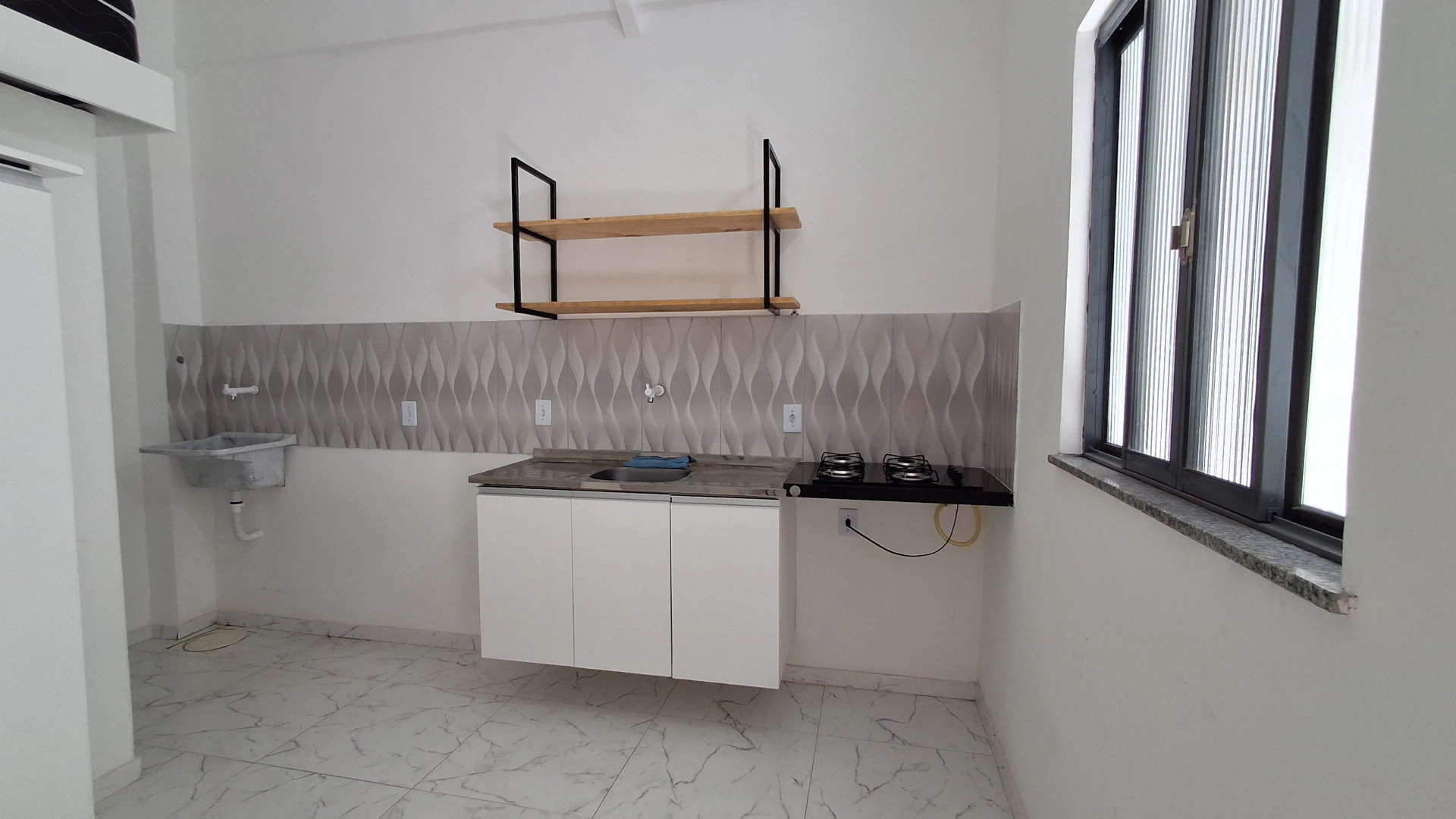 Studio-style kitnet with 1 bedroom and 1 bath — photo 7