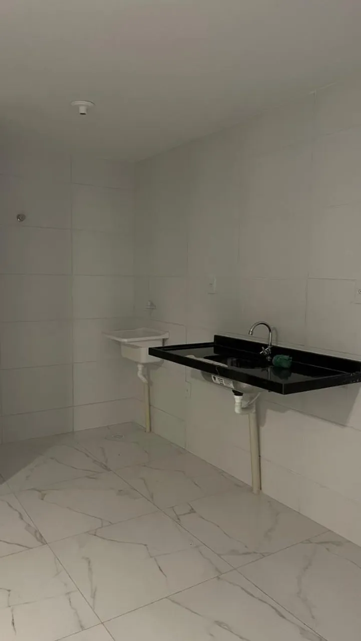 2-bedroom apartment in a building with a pool — photo 2