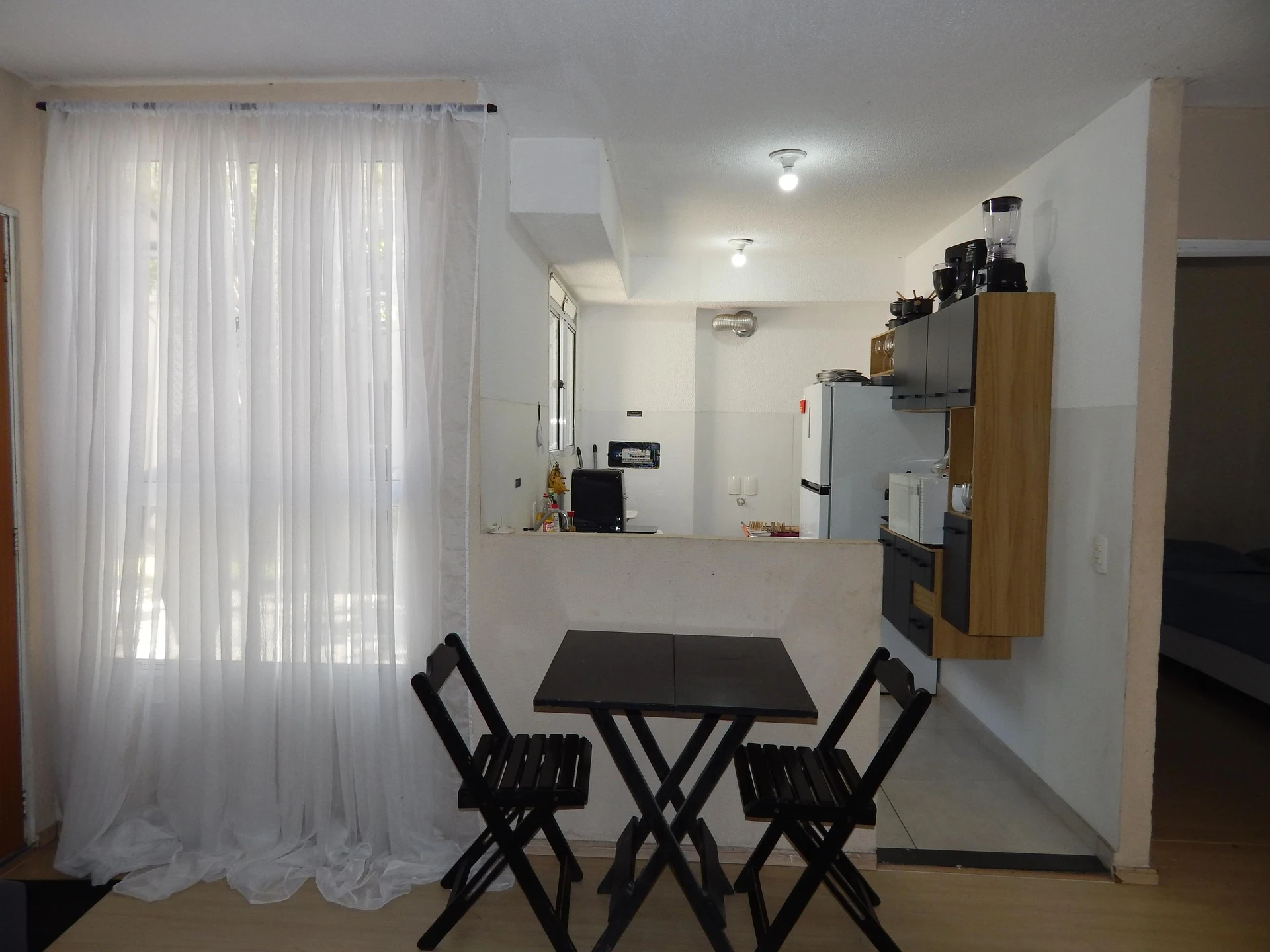 2-bedroom apartment with wood or laminate floors — photo 2