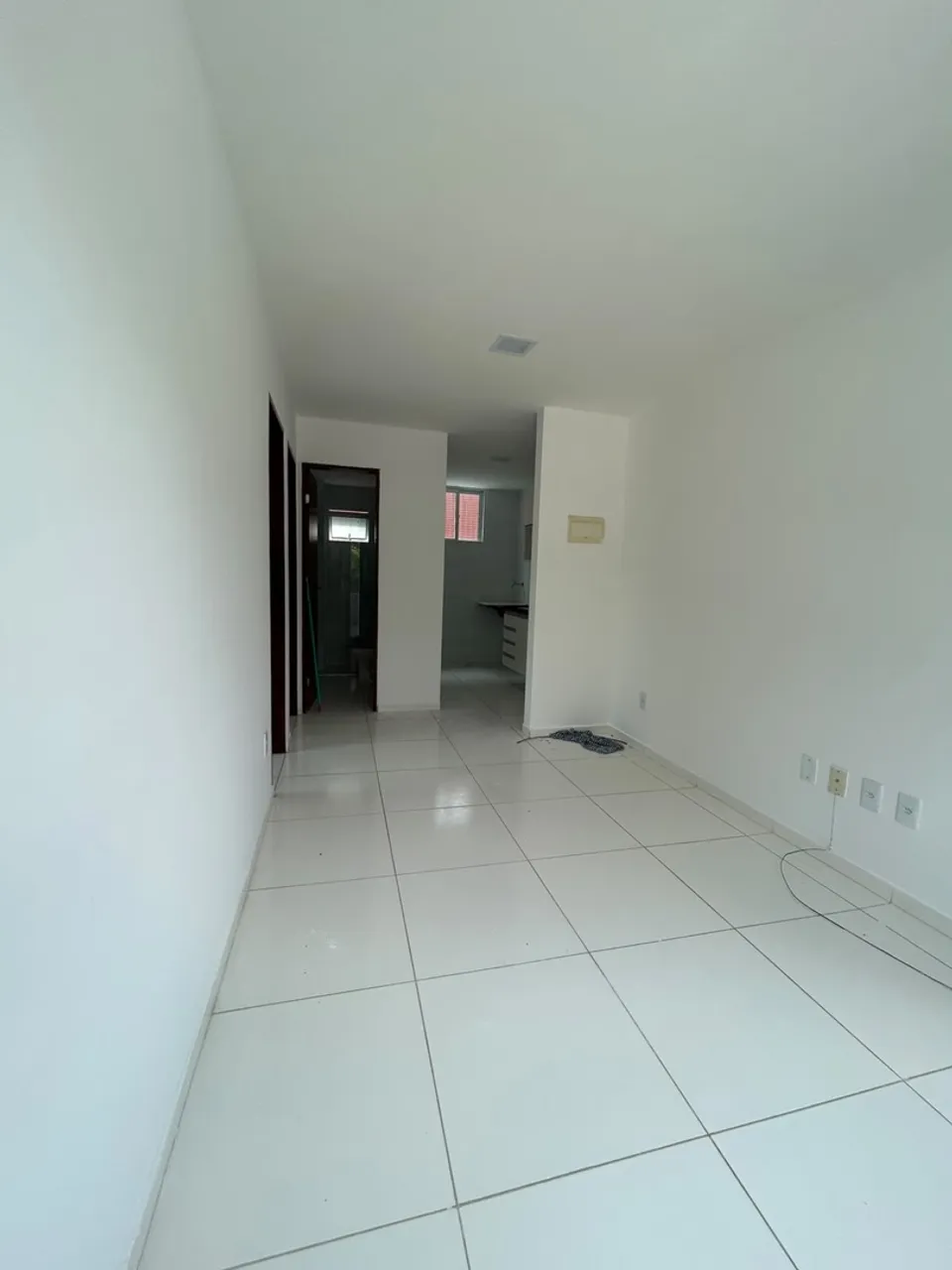 2-bedroom apartment in a building with a pool