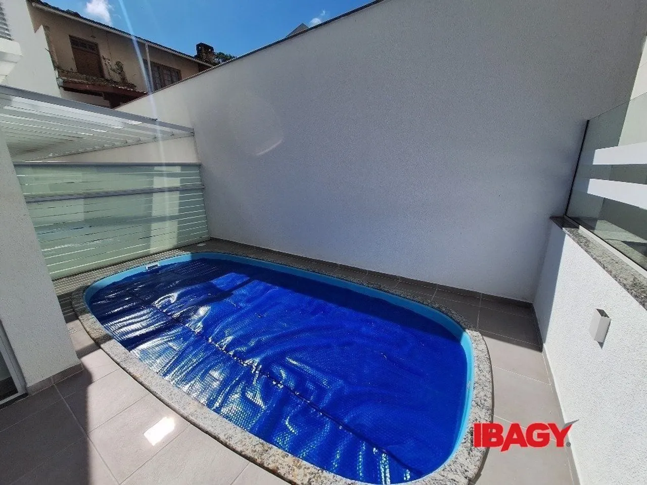 2-bedroom apartment in a building with a pool — photo 14