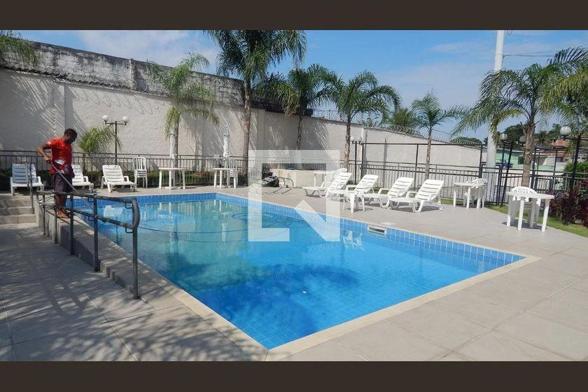 2-bedroom apartment in a building with a pool — photo 7