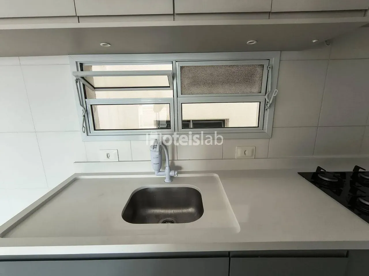 One-bedroom apartment in a building with a gym