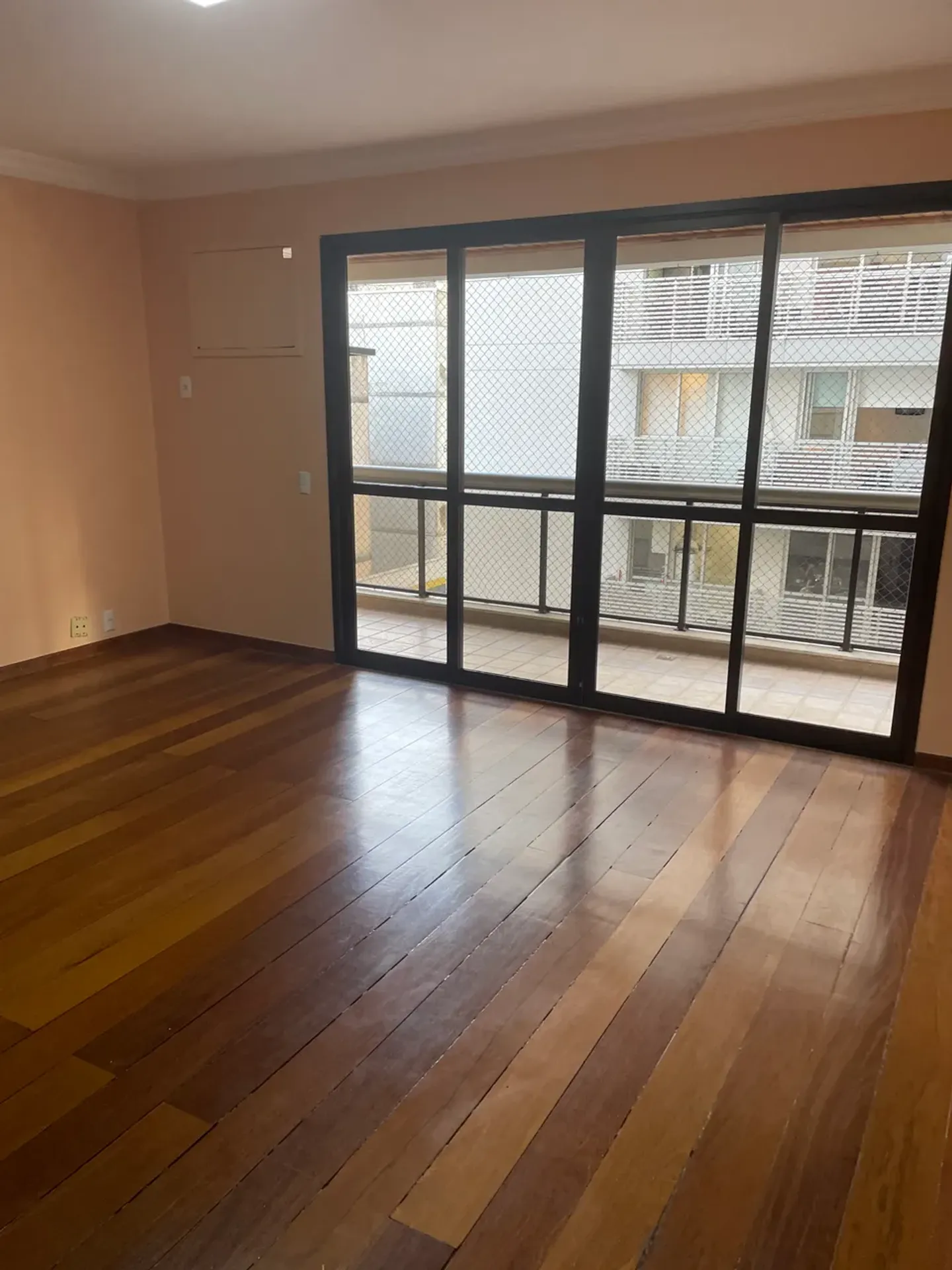 3-bedroom apartment in a building with a pool