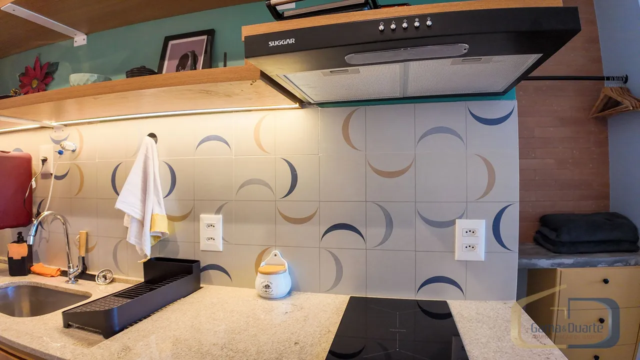 Furnished apartment with open-plan kitchen and glass shower — photo 5