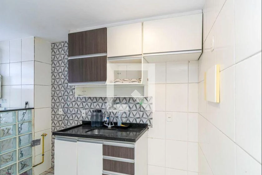 2-bedroom apartment in a building with a pool — photo 6