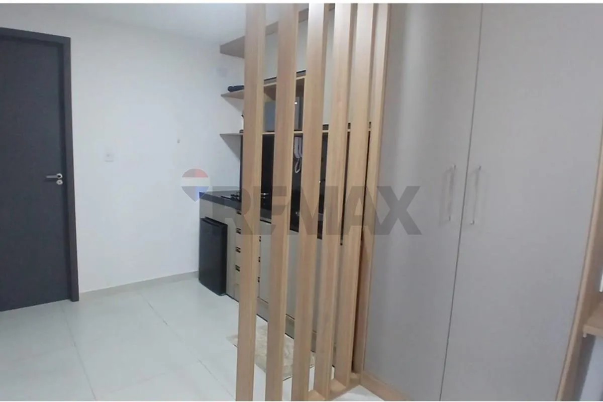One-bedroom apartment in a building with a pool — photo 9