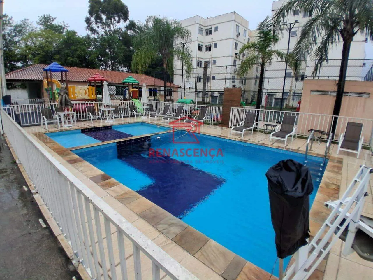 2-bedroom apartment in a building with a pool — photo 14