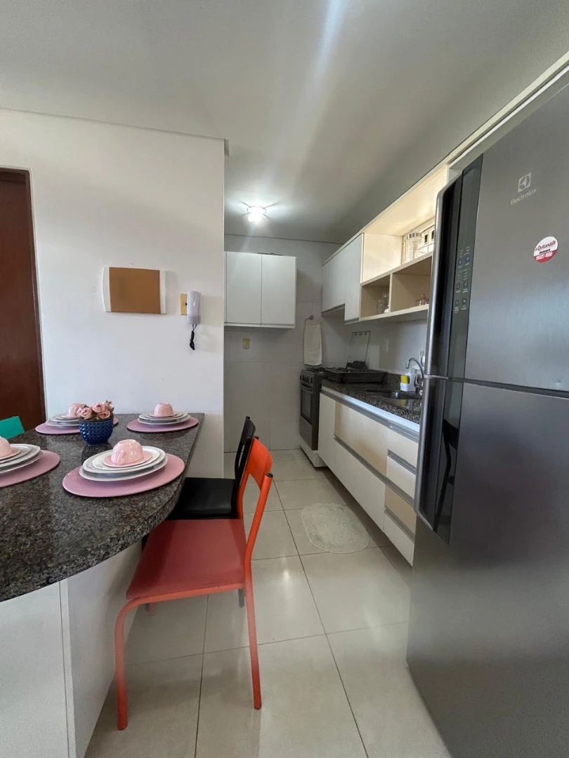 1-bedroom apartment with open-plan kitchen and water views — photo 2