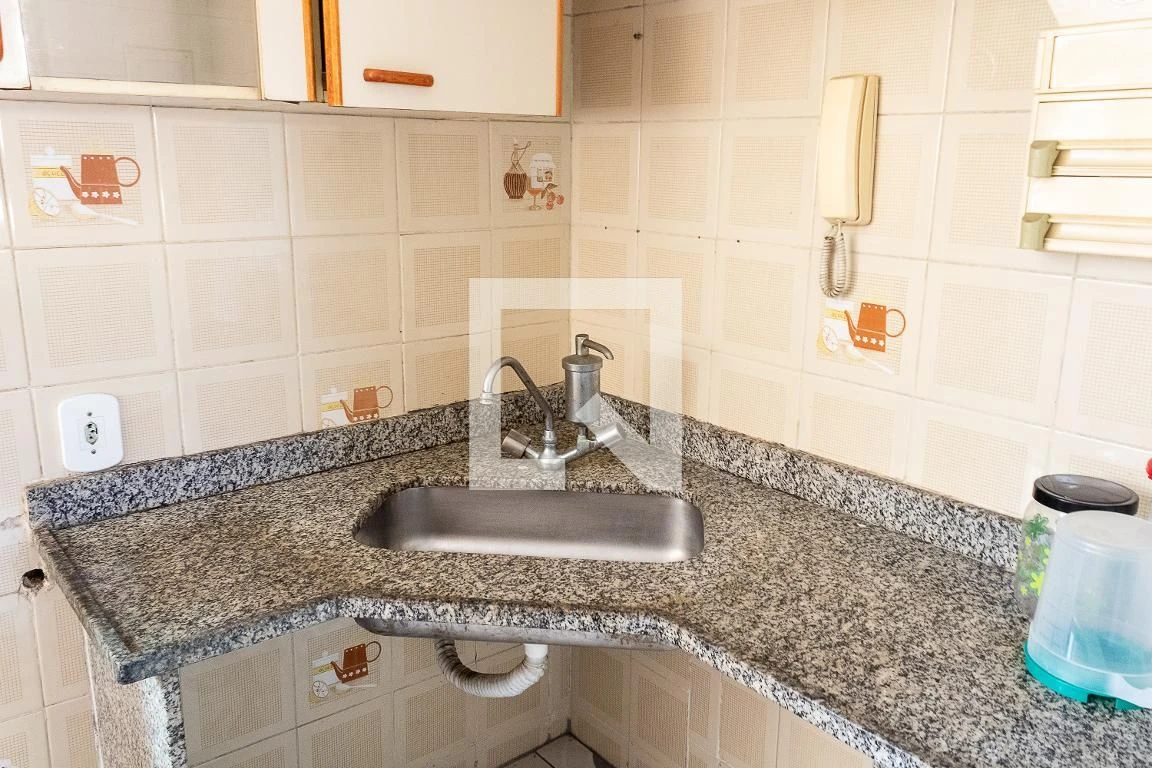 2-bedroom apartment in a building with a pool — photo 13