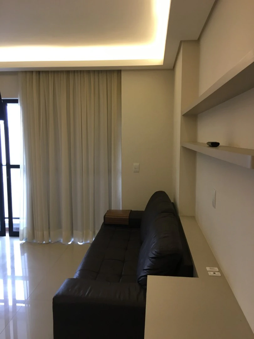 Furnished studio with open-plan kitchen and washing machine — photo 9