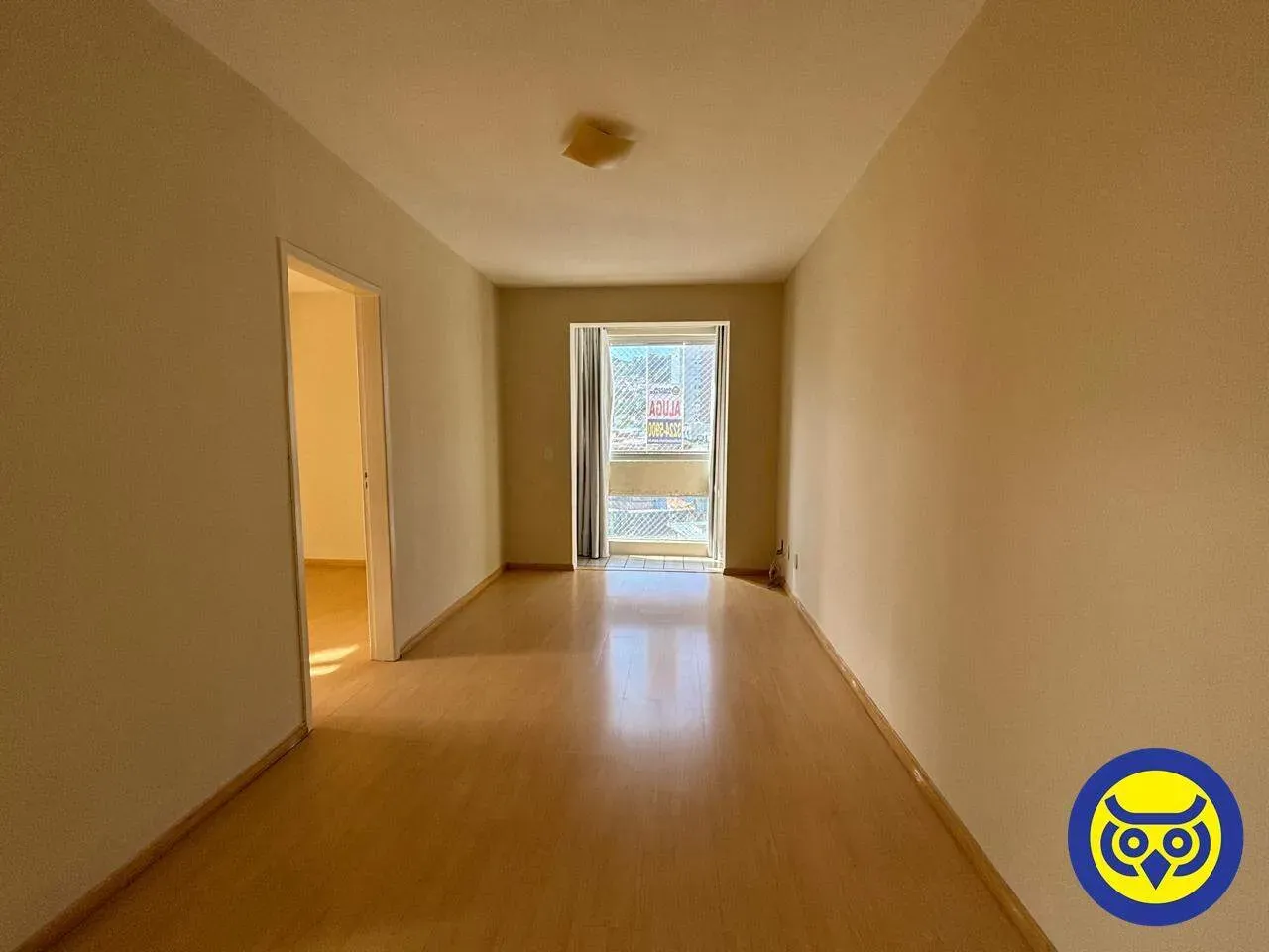 One-bedroom apartment with wood or laminate floors — photo 13