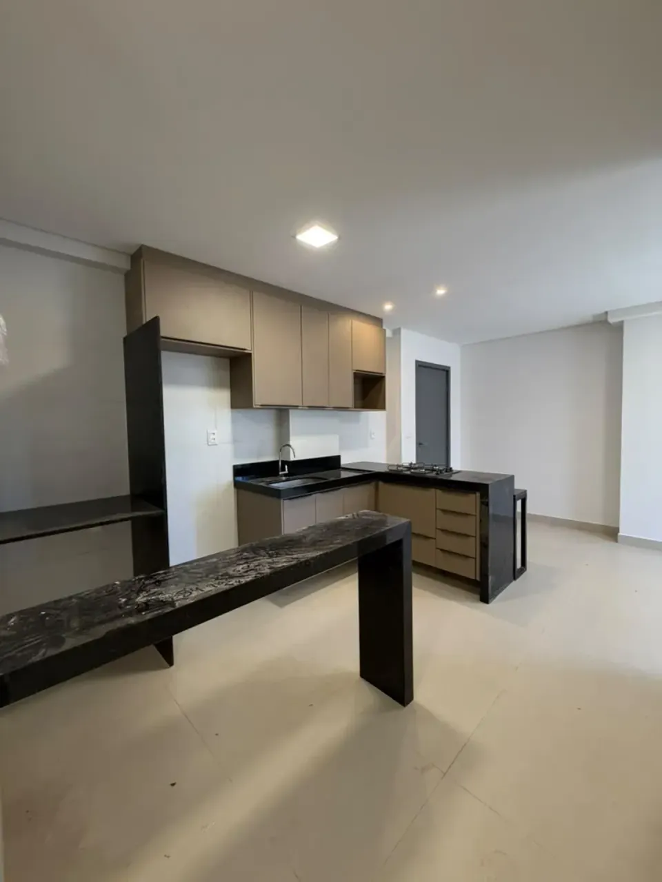 2-bedroom apartment in a building with a pool — photo 3