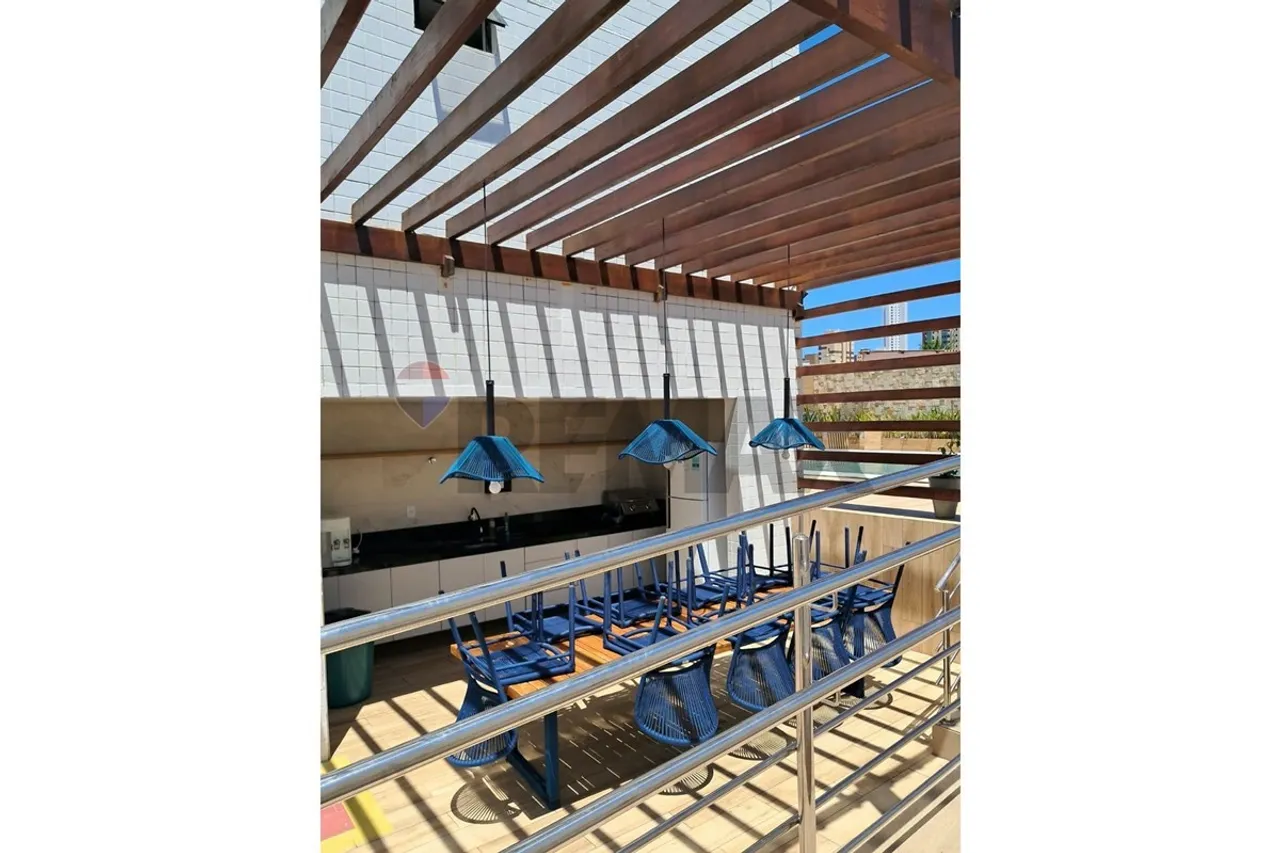 3-bedroom apartment in a building with a pool