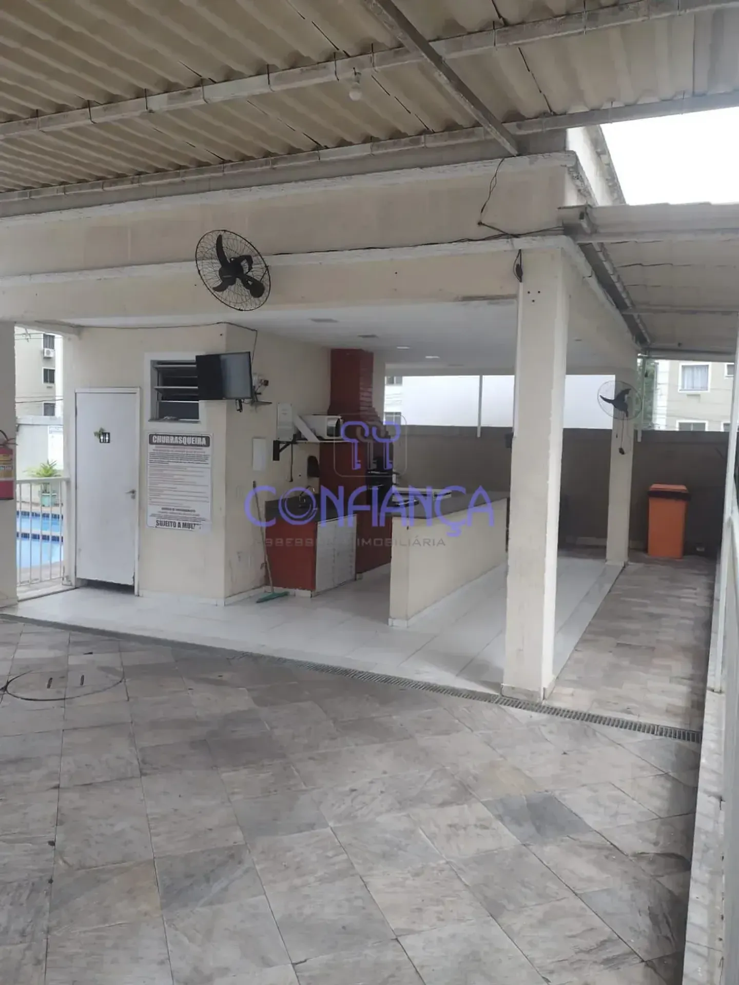 One-bedroom apartment in a building with a pool — photo 7