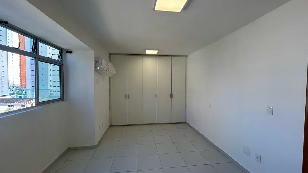3-bedroom apartment in a building with a pool — photo 4