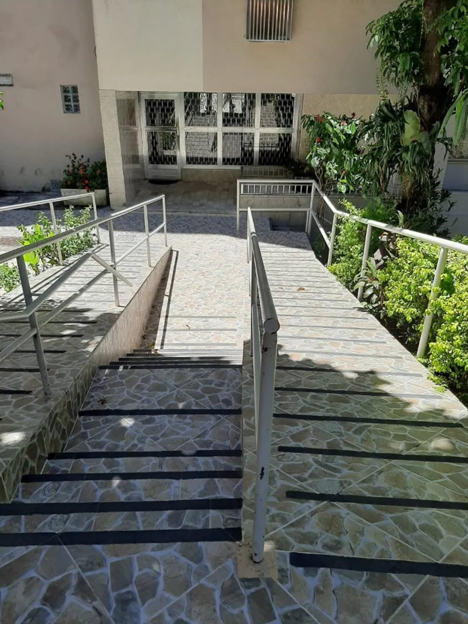 2-bedroom apartment in a building with a pool — photo 10