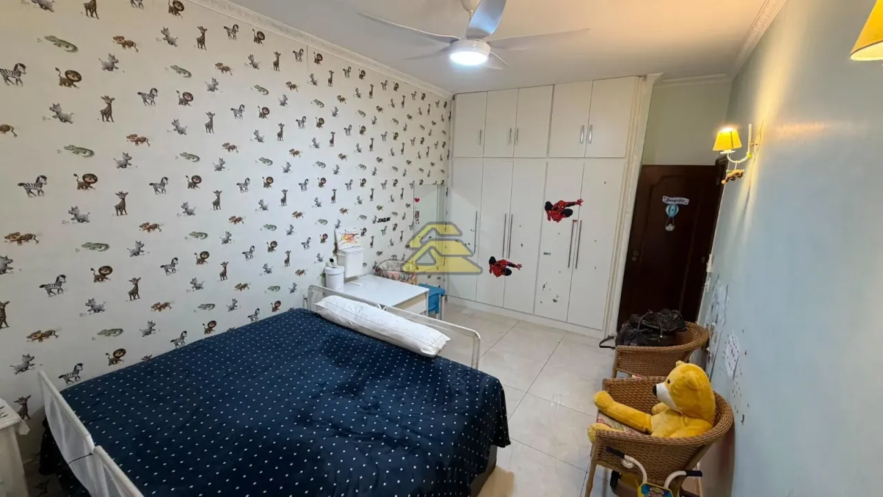 3-bedroom apartment with wall TV unit and tile floors — photo 4
