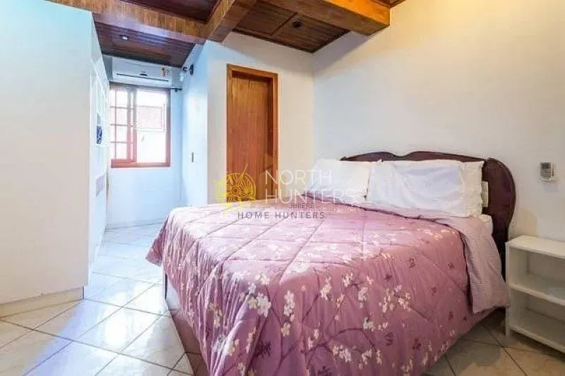 Casa com 4 dormitórios, 2 suítes e churrasqueira na varanda — photo 15