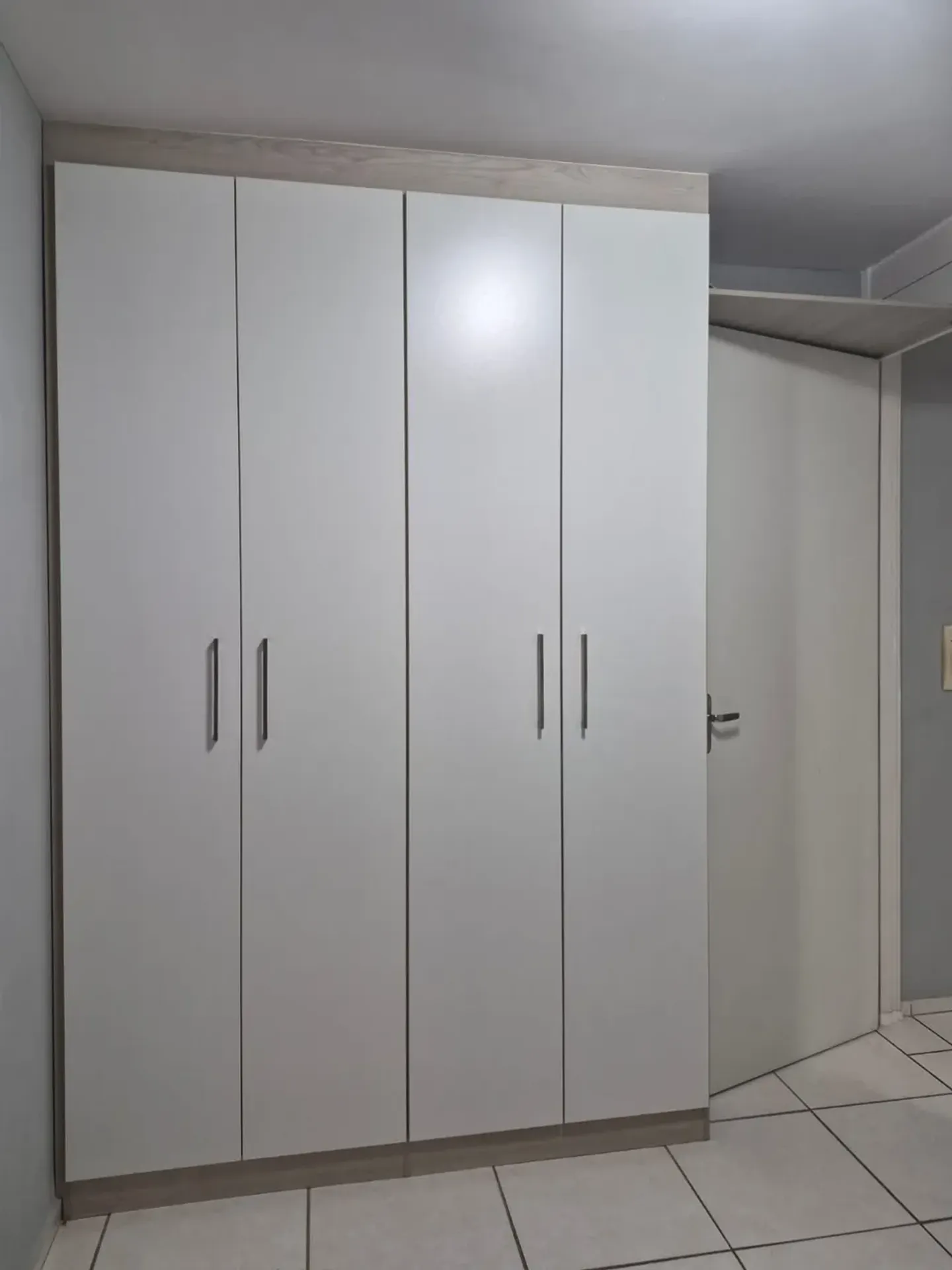 2-bedroom apartment in a building with a pool — photo 16