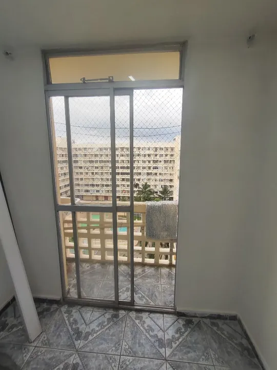2-bedroom apartment in a building with a pool — photo 7