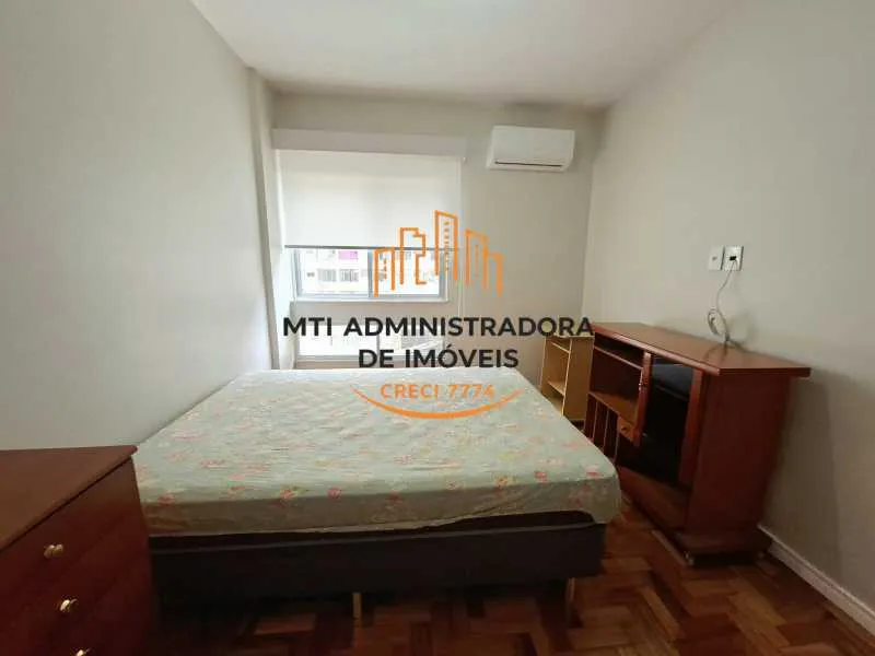 2-bedroom apartment in a building with a pool — photo 10