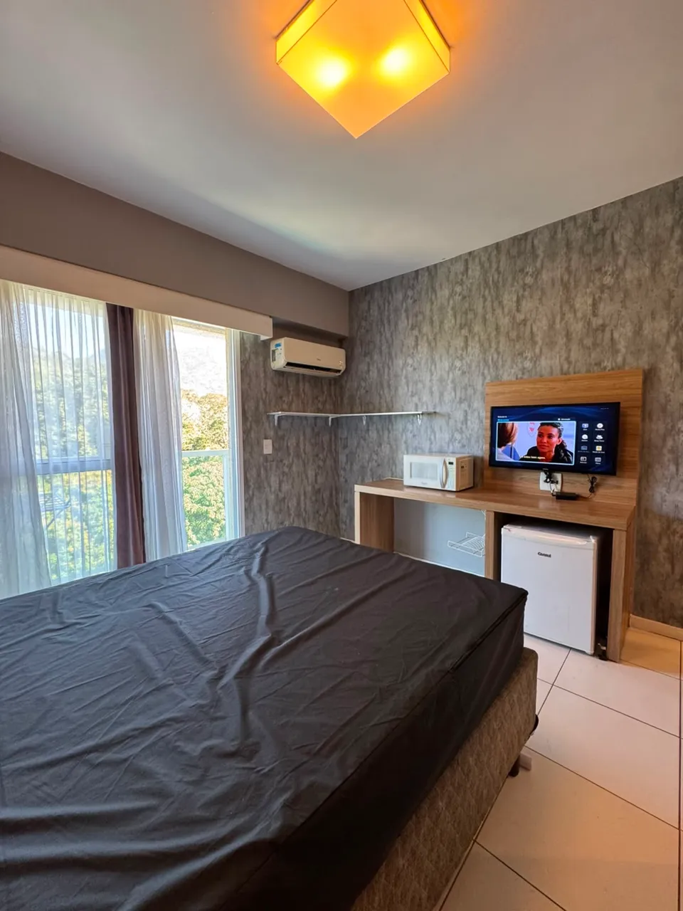 Apartamento de 1 quarto com varanda e 1 vaga — photo 2