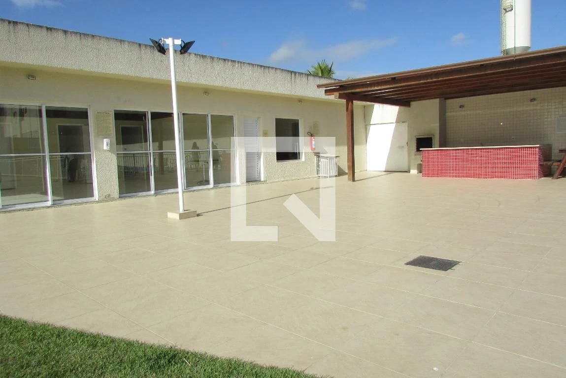 2-bedroom apartment in a building with a pool — photo 26