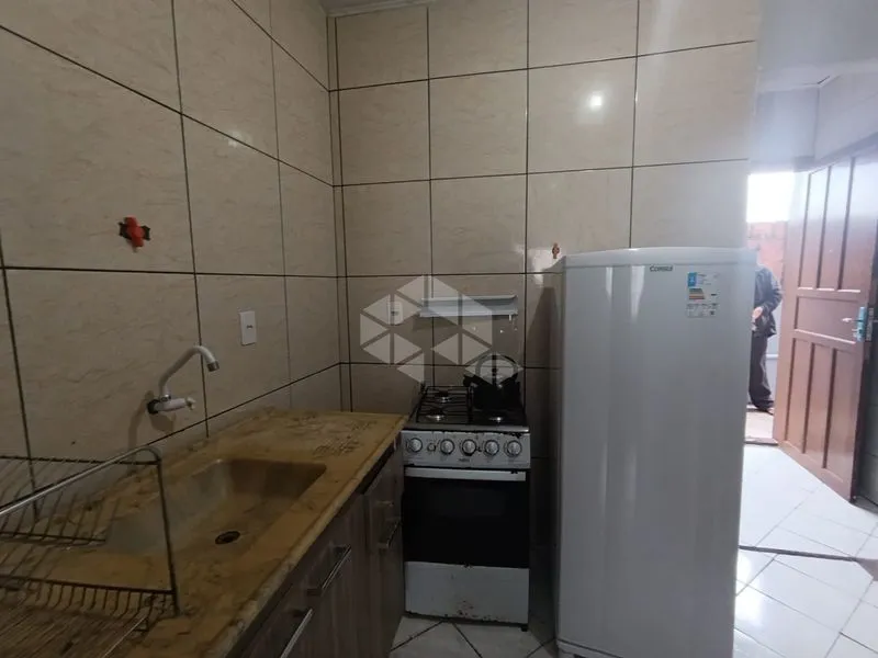 Studio mobiliado de 30 m² com quarto e cozinha separada