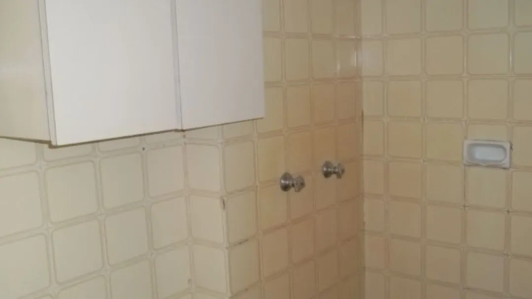 2-bedroom apartment in a building with a pool — photo 13