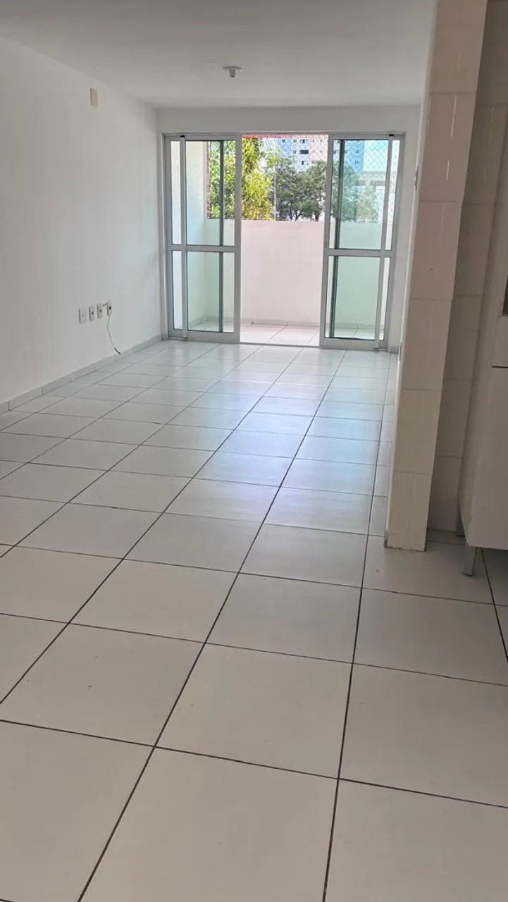 2-bedroom apartment in a building with a pool — photo 3