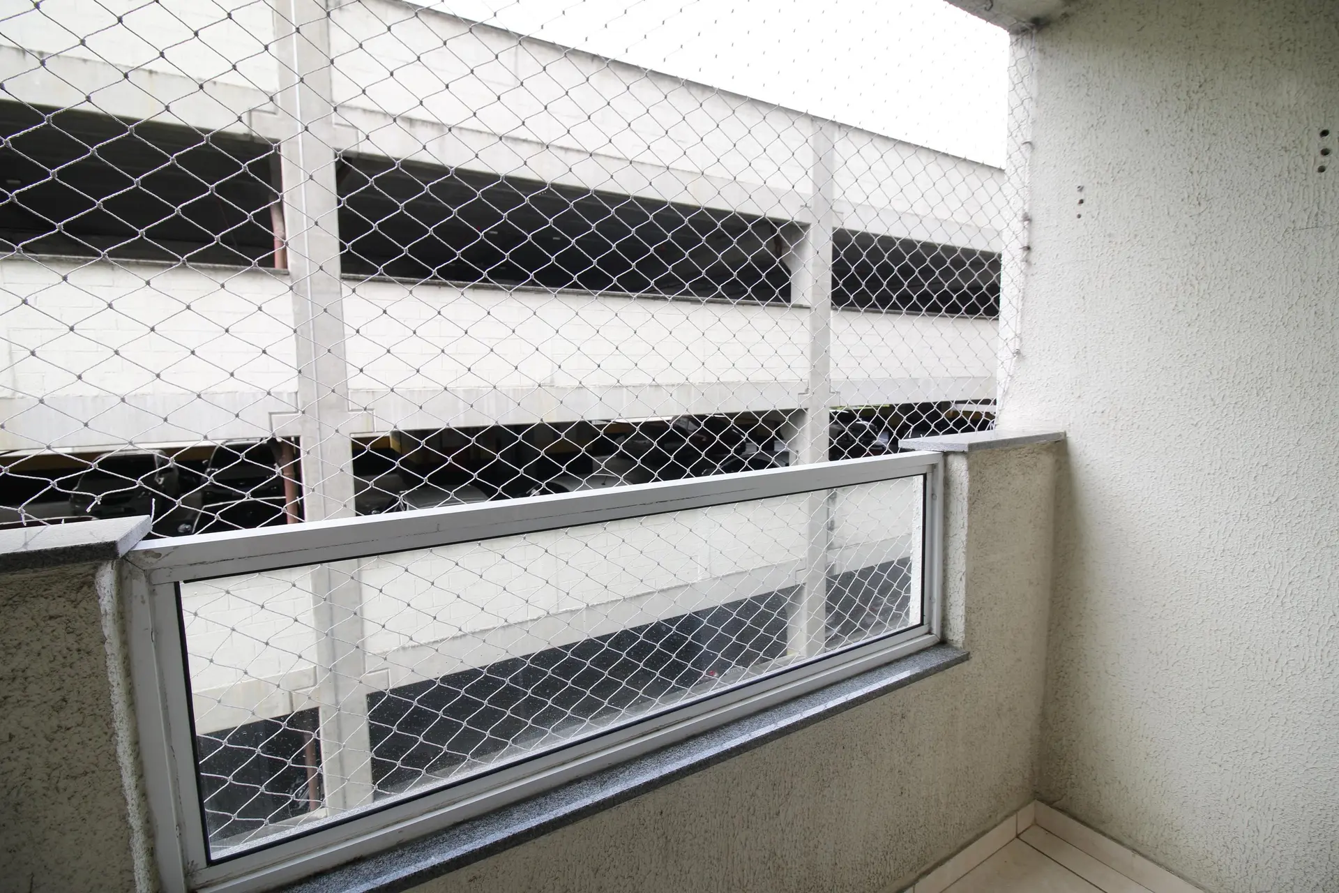 2-bedroom apartment in a building with a pool — photo 13