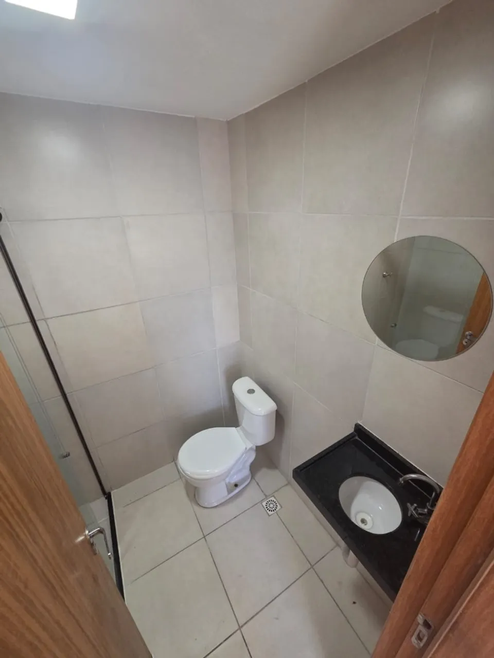 2-bedroom apartment in a building with a pool — photo 16