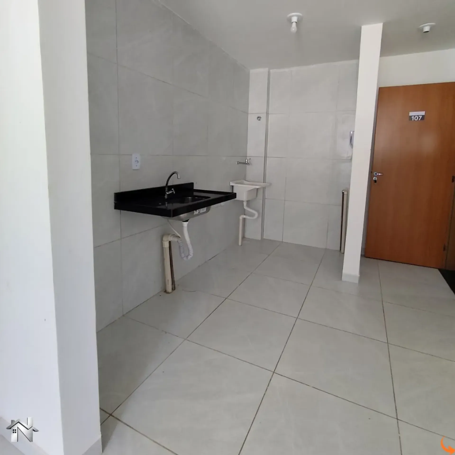 2-bedroom apartment in a building with a pool — photo 2